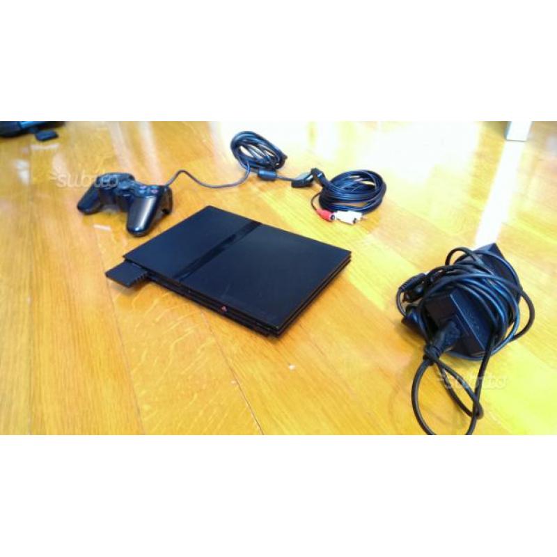 Playstation 2 + giochi + accessori